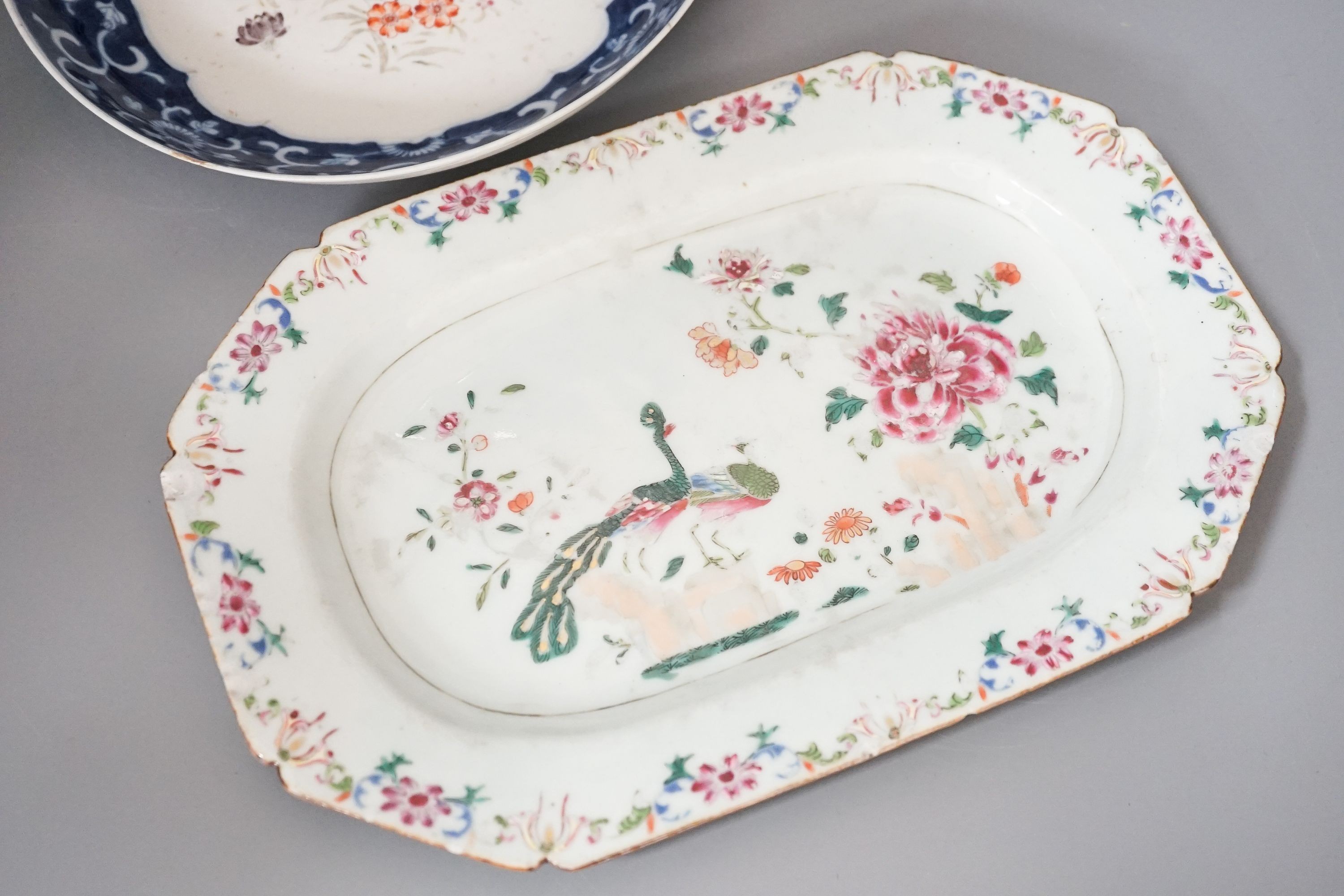 A Chinese famille rose double peacock dish, Qianlong, 28 cm and a Chinese famille rose and underglaze blue saucer dish, Jiaqing